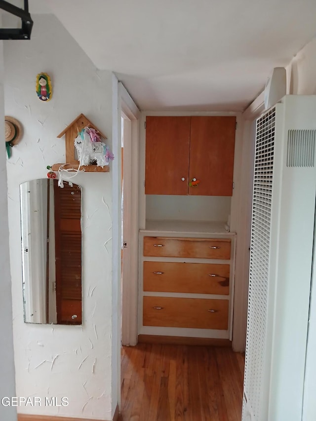 1700 Wainwright Dr, El Paso, TX 79903 - hall with a heating unit and light wood-type flooring