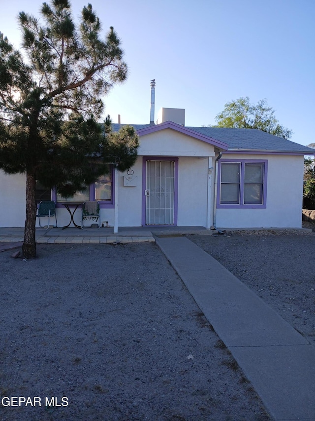 1700 Wainwright Dr, El Paso, TX 79903 - view of front of house featuring stucco siding and covered porch