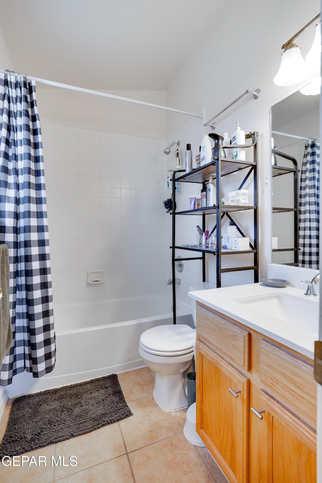 7930 Howard St, El Paso, TX 79904 - bathroom featuring shower / tub combo, tile patterned floors, toilet, and vanity