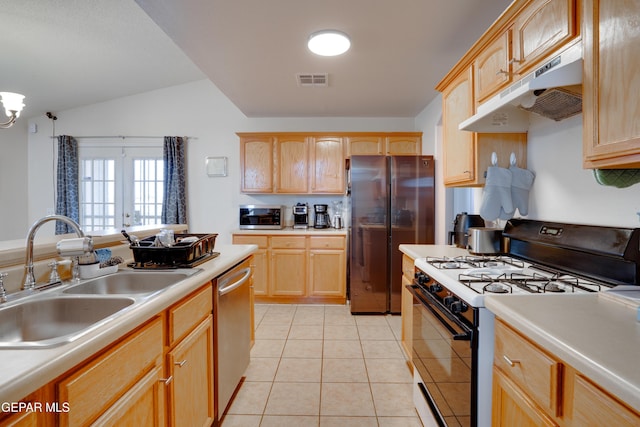 7930 Howard St, El Paso, TX 79904 - kitchen with appliances with stainless steel finishes, under cabinet range hood, a sink, light brown cabinets, and light countertops