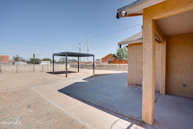 7930 Howard St, El Paso, TX 79904 - fenced backyard with a patio area
