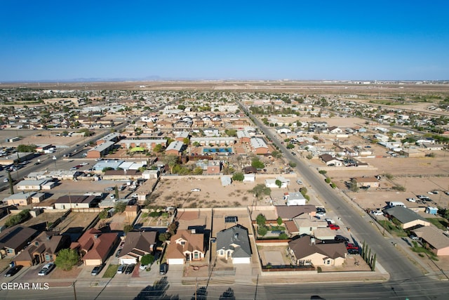 7930 Howard St, El Paso, TX 79904 - aerial view of property and surrounding area with nearby suburban area and mountains