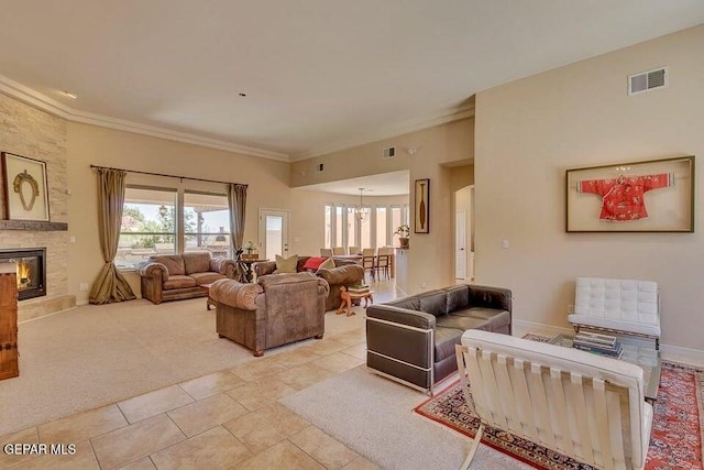 6365 Franklin Trail Dr, El Paso, TX 79912 - living area featuring ornamental molding, a fireplace, light tile patterned floors, and light colored carpet