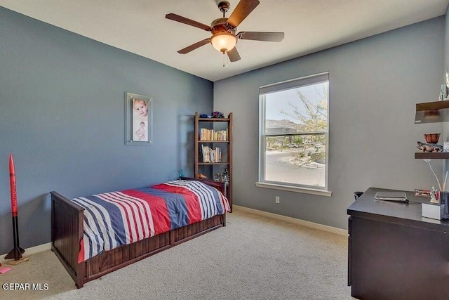 6365 Franklin Trail Dr, El Paso, TX 79912 - bedroom with light colored carpet, a desk, and ceiling fan