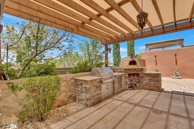 6365 Franklin Trail Dr, El Paso, TX 79912 - view of patio with exterior kitchen