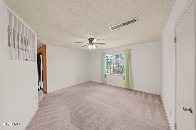5033 Royal Dr, El Paso, TX 79924 - carpeted empty room featuring a ceiling fan and a textured ceiling