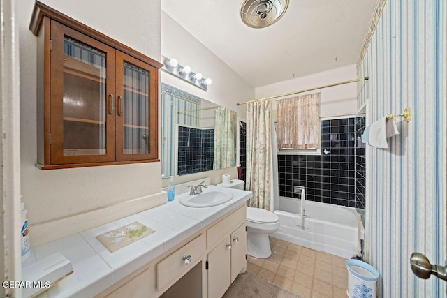 5033 Royal Dr, El Paso, TX 79924 - full bathroom with toilet, vanity, shower / tub combo with curtain, and tile patterned floors