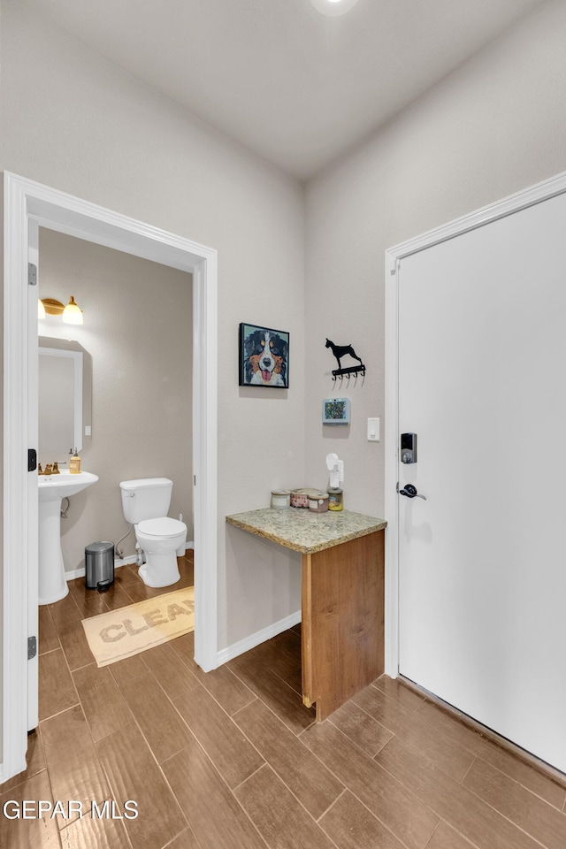 6716 Red Canyon Sage Ln, El Paso, TX 79912 - mudroom with wood finished floors and baseboards