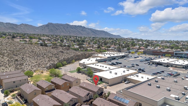 6716 Red Canyon Sage Ln, El Paso, TX 79912 - aerial perspective of suburban area featuring a mountainous background