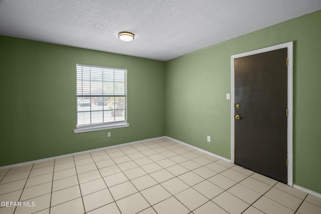 12008 Braveheart Ave, El Paso, TX 79936 - unfurnished room featuring a textured ceiling and baseboards