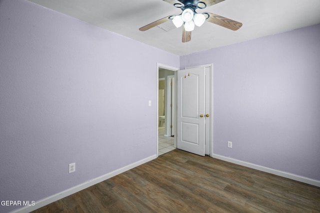 12008 Braveheart Ave, El Paso, TX 79936 - unfurnished room featuring ceiling fan, baseboards, and wood finished floors