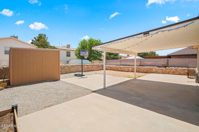 12008 Braveheart Ave, El Paso, TX 79936 - fenced backyard featuring a patio area