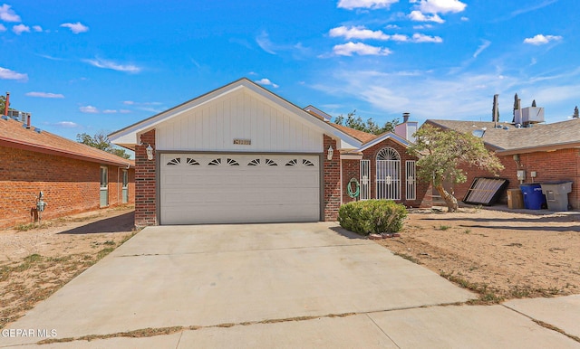 12119 Quail Harvest Ln, El Paso, TX 79936 - ranch-style home featuring brick siding, driveway, and a garage