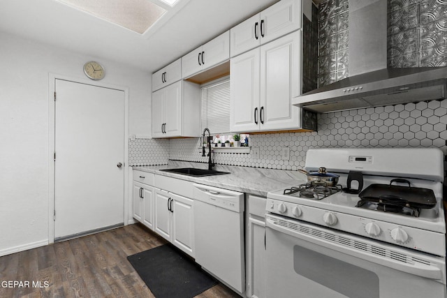 12119 Quail Harvest Ln, El Paso, TX 79936 - kitchen featuring wall chimney exhaust hood, white appliances, a sink, and white cabinets