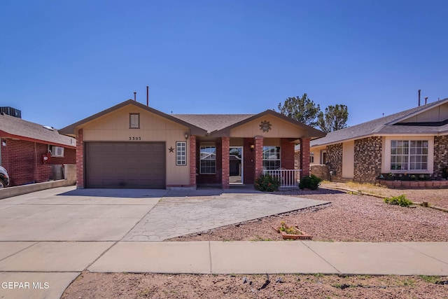 3303 Ward Robert Pl, El Paso, TX 79936 - single story home featuring a garage, concrete driveway, covered porch, and brick siding