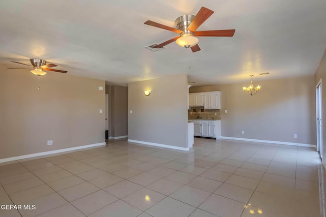 3303 Ward Robert Pl, El Paso, TX 79936 - unfurnished living room with a chandelier, a ceiling fan, light tile patterned floors, and baseboards