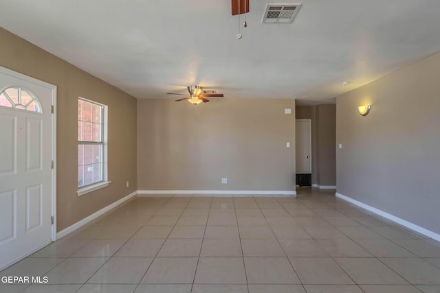 3303 Ward Robert Pl, El Paso, TX 79936 - entryway with ceiling fan, light tile patterned floors, and baseboards