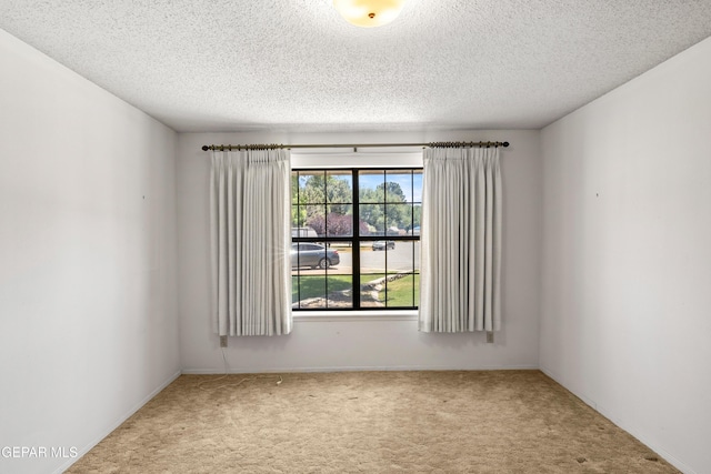 5445 Connors Ln, El Paso, TX 79932 - unfurnished room with carpet floors and a textured ceiling