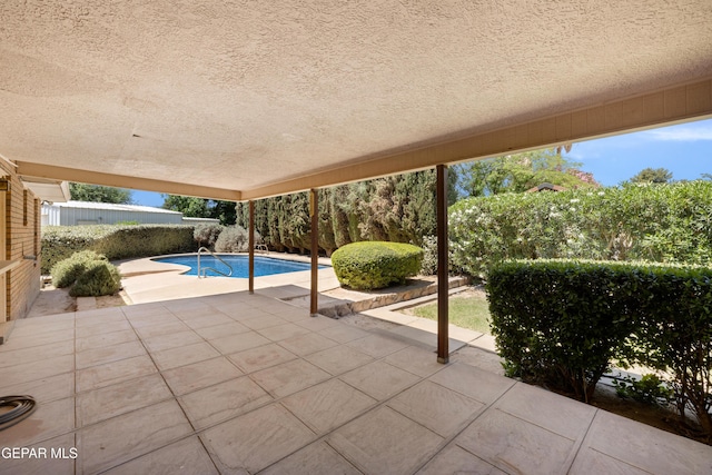 5445 Connors Ln, El Paso, TX 79932 - fenced backyard featuring a patio area