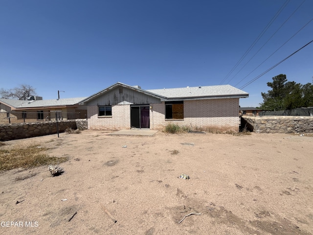 736 Jamestown Rd, El Paso, TX 79907 - view of front of property featuring brick siding and board and batten siding