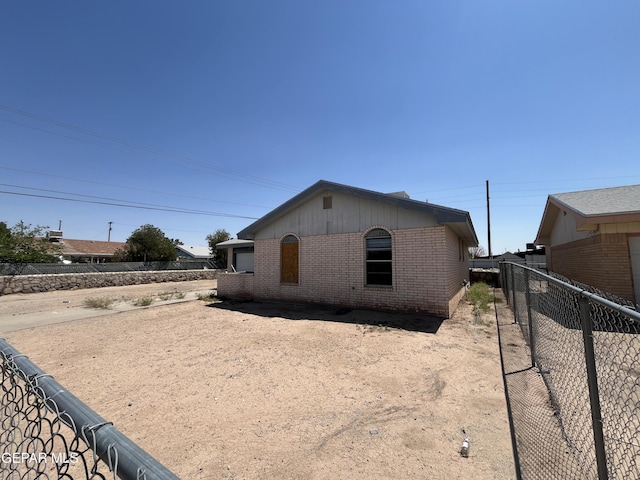 736 Jamestown Rd, El Paso, TX 79907 - view of property exterior featuring brick siding