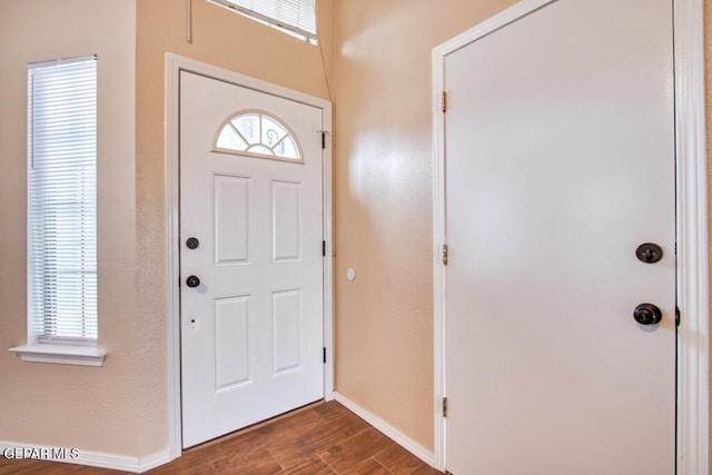 11924 Mesquite Rock Dr, El Paso, TX 79934 - foyer with dark wood finished floors and baseboards