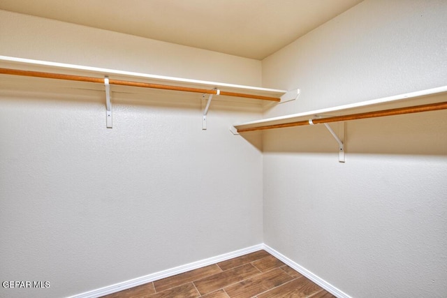 11924 Mesquite Rock Dr, El Paso, TX 79934 - spacious closet with dark wood-type flooring