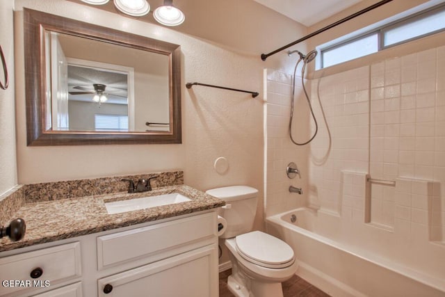 11924 Mesquite Rock Dr, El Paso, TX 79934 - full bathroom featuring toilet, vanity, shower / washtub combination, a textured wall, and a ceiling fan