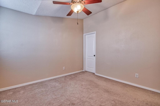 11924 Mesquite Rock Dr, El Paso, TX 79934 - spare room featuring carpet flooring, ceiling fan, baseboards, and a textured ceiling