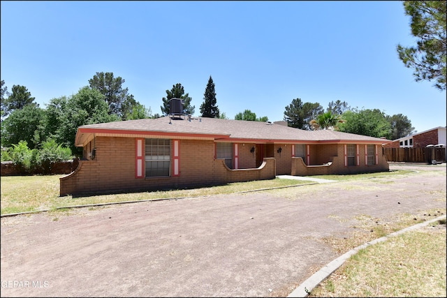 312 Caporal Ct, El Paso, TX 79932 - single story home featuring brick siding and a front lawn