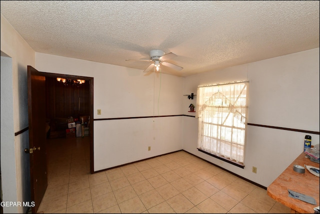 312 Caporal Ct, El Paso, TX 79932 - unfurnished room with a ceiling fan and a textured ceiling