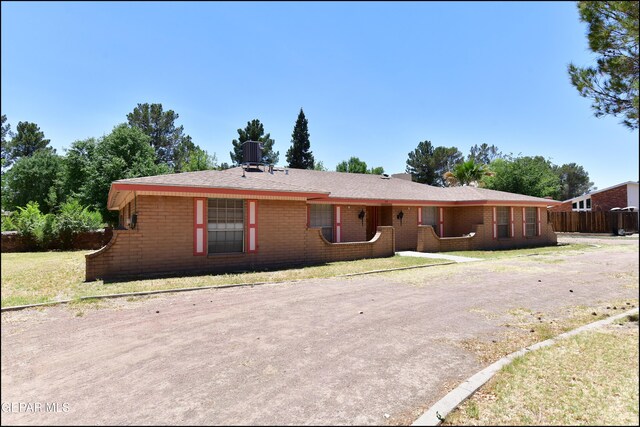 312 Caporal Ct, El Paso, TX 79932 - single story home featuring brick siding and a front lawn
