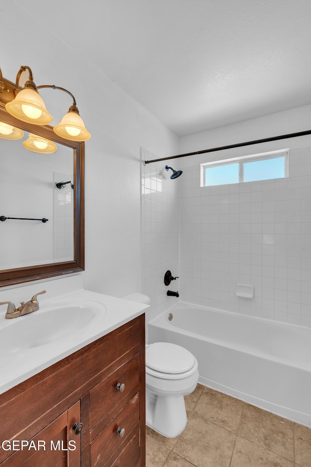7461 Plaza Redonda Dr, El Paso, TX 79912 - full bathroom with vanity, shower / tub combination, toilet, and tile patterned flooring