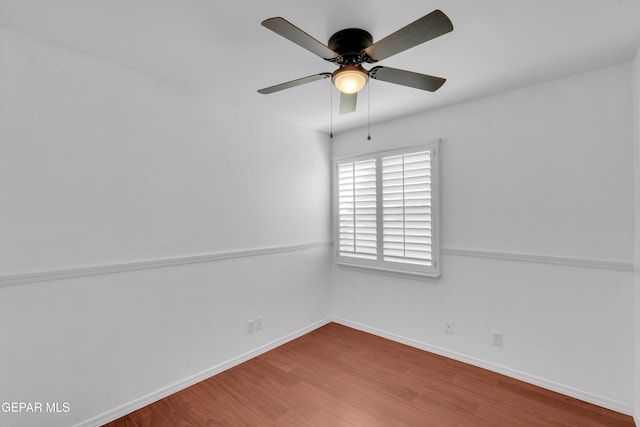 7461 Plaza Redonda Dr, El Paso, TX 79912 - empty room with wood finished floors, a ceiling fan, and baseboards