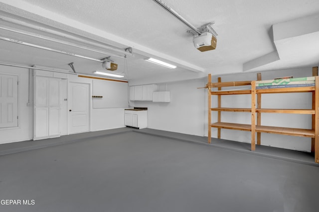 7461 Plaza Redonda Dr, El Paso, TX 79912 - garage with a garage door opener
