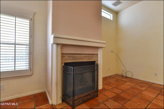 6609 El Poste Ct, El Paso, TX 79912 - detailed view of a tiled fireplace and baseboards