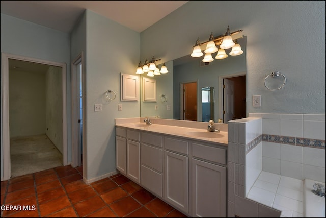 6609 El Poste Ct, El Paso, TX 79912 - full bath with double vanity and tile patterned floors