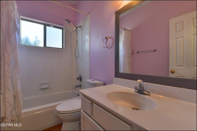6609 El Poste Ct, El Paso, TX 79912 - full bath featuring vanity, shower / tub combo, toilet, and a textured wall