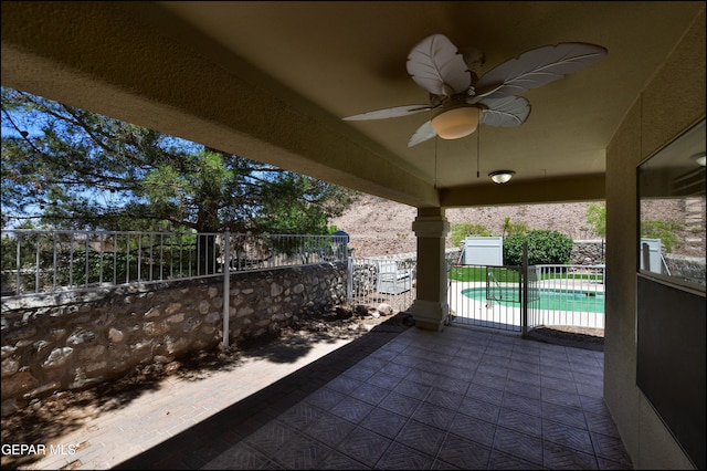 6609 El Poste Ct, El Paso, TX 79912 - view of patio / terrace with a ceiling fan