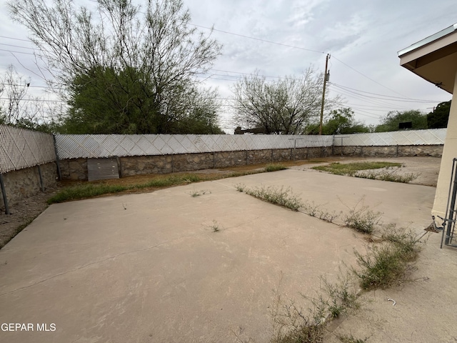 8244 Strickland Dr, El Paso, TX 79907 - fenced backyard featuring a patio area