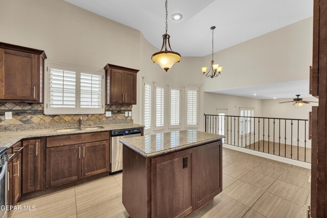 3199 Red Maple Dr, El Paso, TX 79938 - kitchen featuring stainless steel dishwasher, a sink, tasteful backsplash, ceiling fan, and light tile patterned flooring