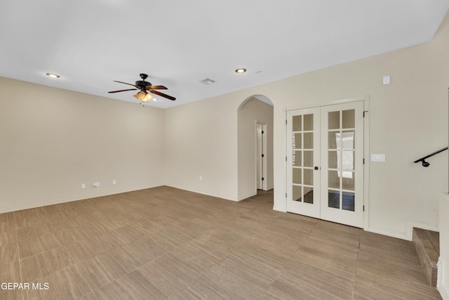3199 Red Maple Dr, El Paso, TX 79938 - empty room with french doors, arched walkways, a ceiling fan, recessed lighting, and baseboards