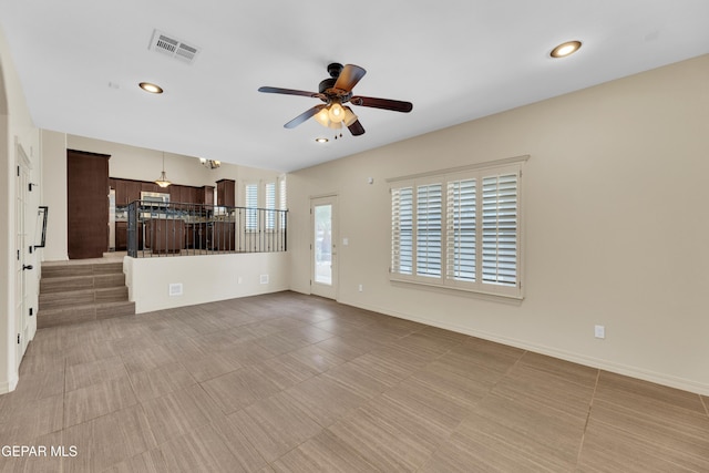 3199 Red Maple Dr, El Paso, TX 79938 - unfurnished living room with a ceiling fan, recessed lighting, and baseboards