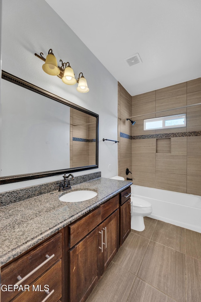 3199 Red Maple Dr, El Paso, TX 79938 - bathroom featuring vanity, toilet, and bathing tub / shower combination