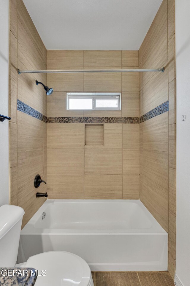 3199 Red Maple Dr, El Paso, TX 79938 - full bathroom featuring toilet, bathtub / shower combination, and wood finished floors