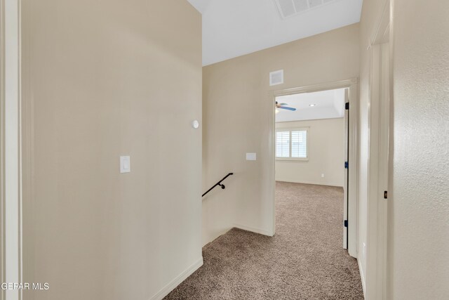 3199 Red Maple Dr, El Paso, TX 79938 - hall with carpet, baseboards, and an upstairs landing