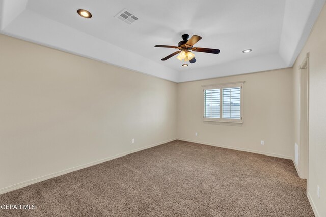 3199 Red Maple Dr, El Paso, TX 79938 - spare room featuring carpet, a raised ceiling, recessed lighting, and ceiling fan