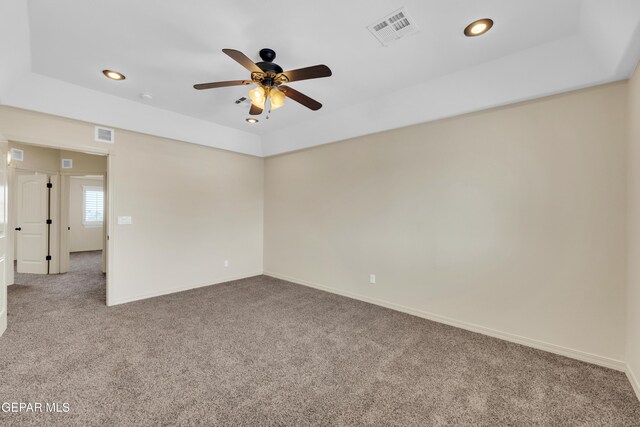 3199 Red Maple Dr, El Paso, TX 79938 - carpeted empty room featuring ceiling fan, recessed lighting, baseboards, and a tray ceiling