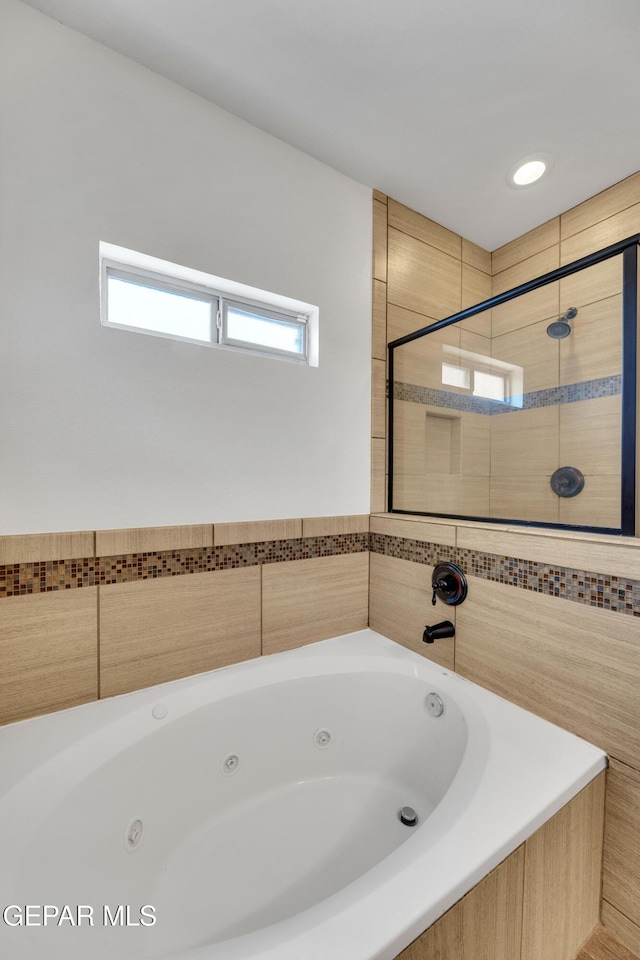 3199 Red Maple Dr, El Paso, TX 79938 - bathroom with a tub with jets and a tile shower