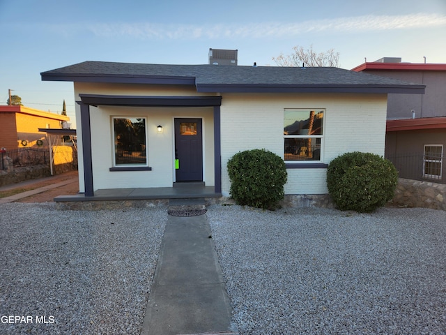 4122 Cumberland Ave, El Paso, TX 79903 - view of front facade featuring brick siding and a shingled roof